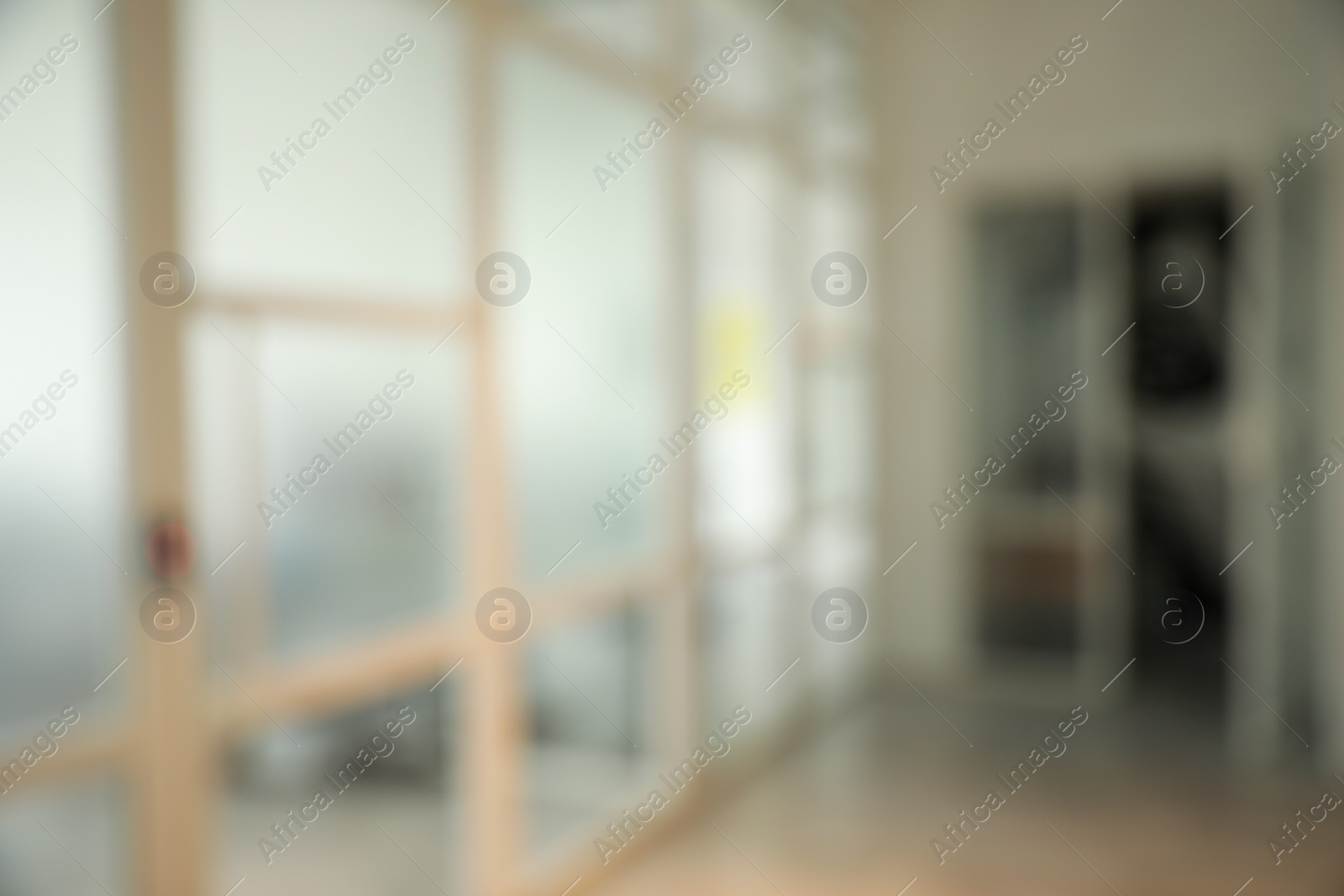 Photo of Blurred view of empty corridor in company