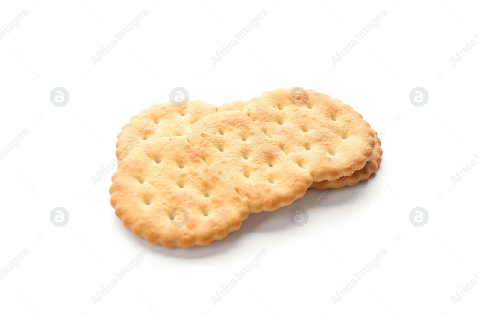 Photo of Crispy crackers isolated on white. Delicious snack