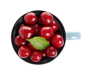 Light blue cup of delicious ripe sweet cherries on white background, top view