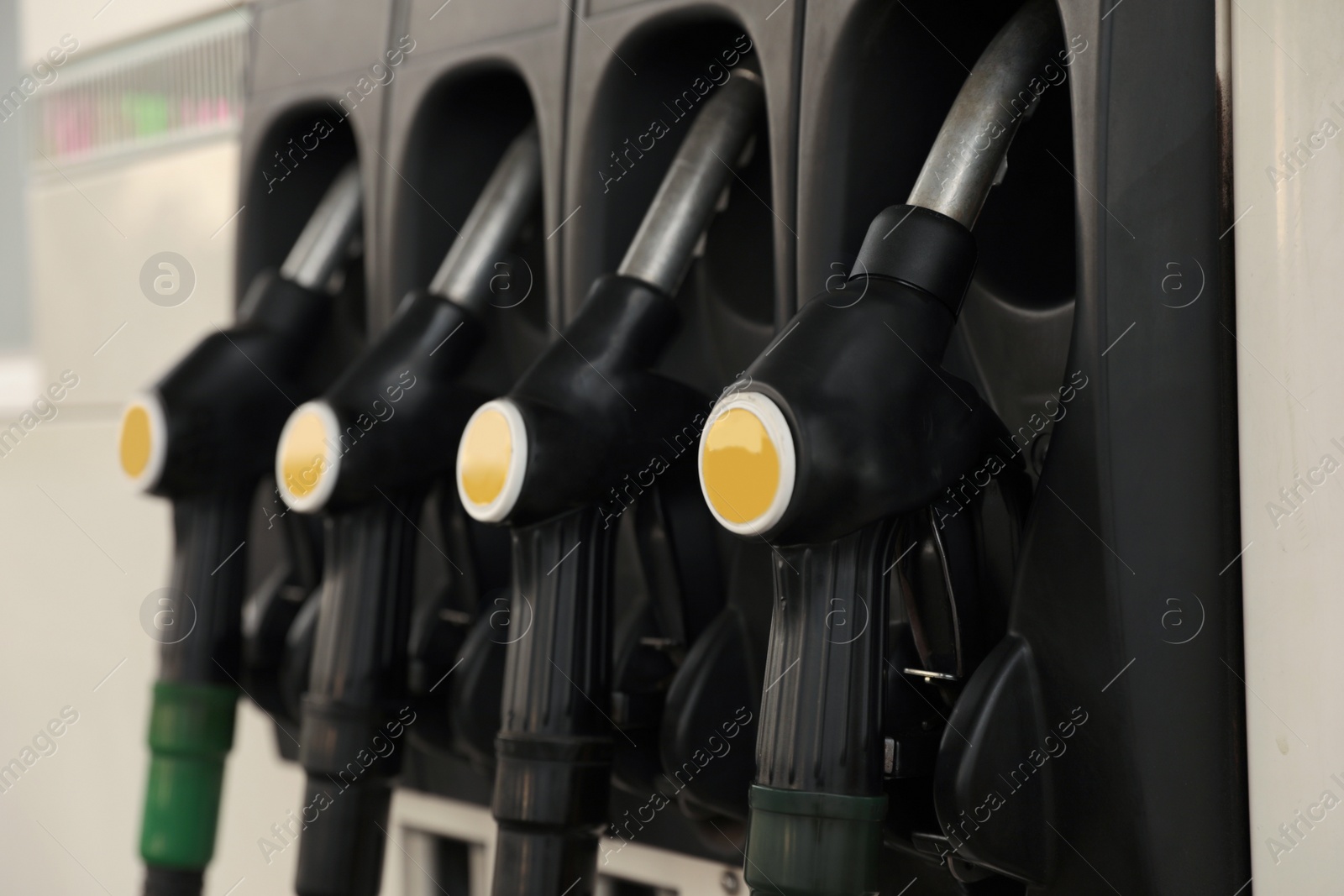 Photo of Gasoline pump at modern gas filling station, closeup