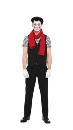 Mime artist in beret posing on white background