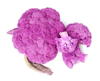Photo of Cut purple cauliflowers on white background, top view. Healthy food