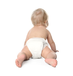 Photo of Little baby in diaper on white background, back view
