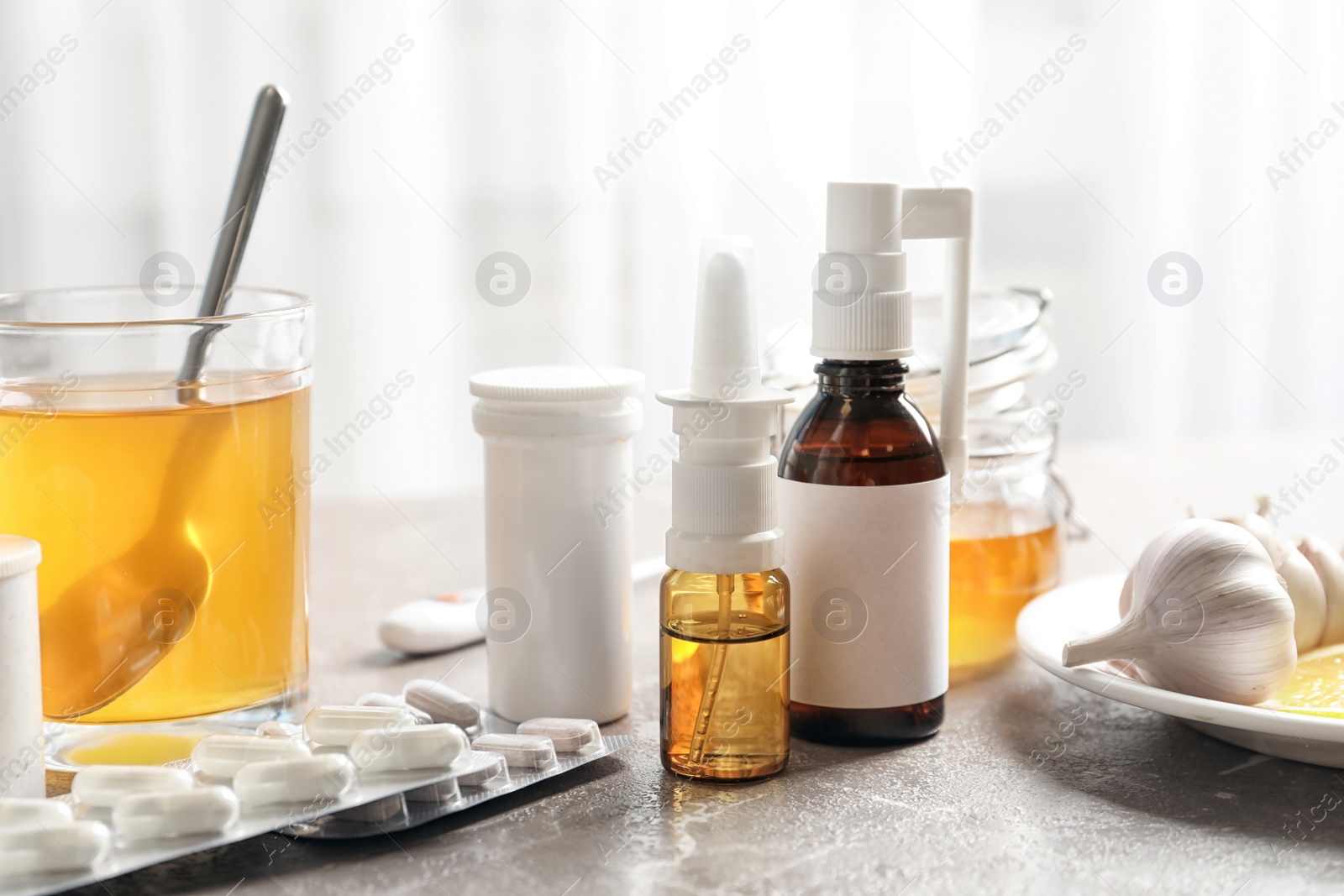 Photo of Natural and medical cold remedies on table