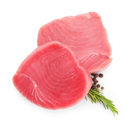Fresh raw tuna fillets with peppercorns and rosemary on white background, top view