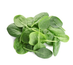 Pile of fresh green healthy baby spinach leaves on white background, top view