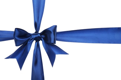 Photo of Blue ribbon with bow on white background. Decoration for gift box