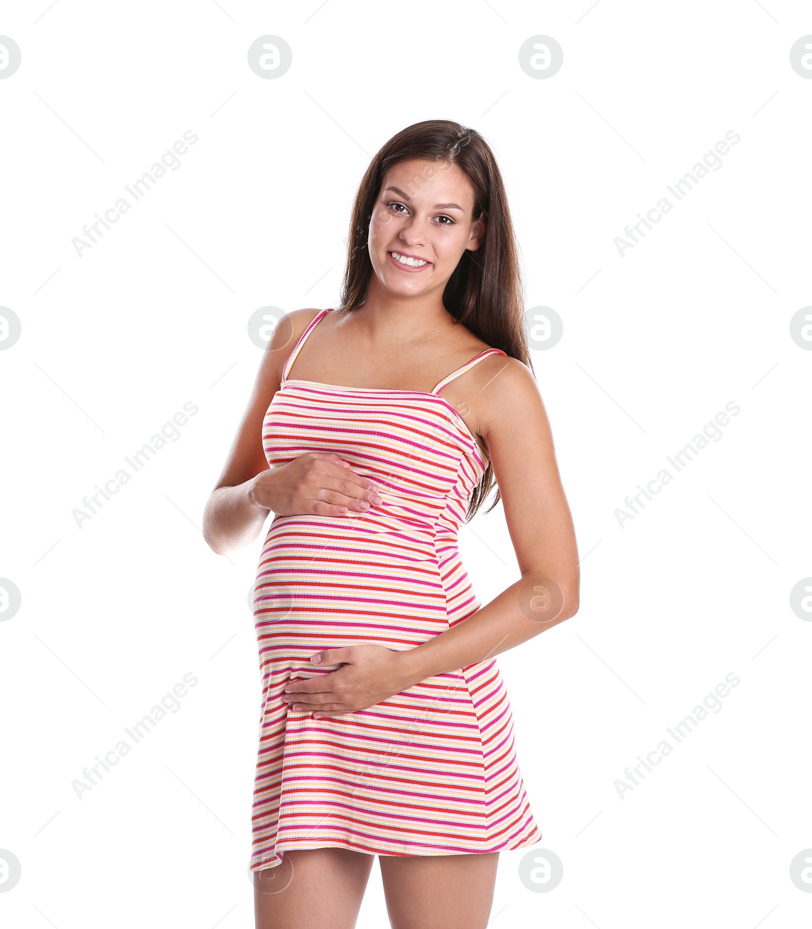 Photo of Happy pregnant woman posing on white background