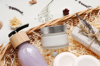 Photo of Spa gift set with different personal care products on white table, closeup