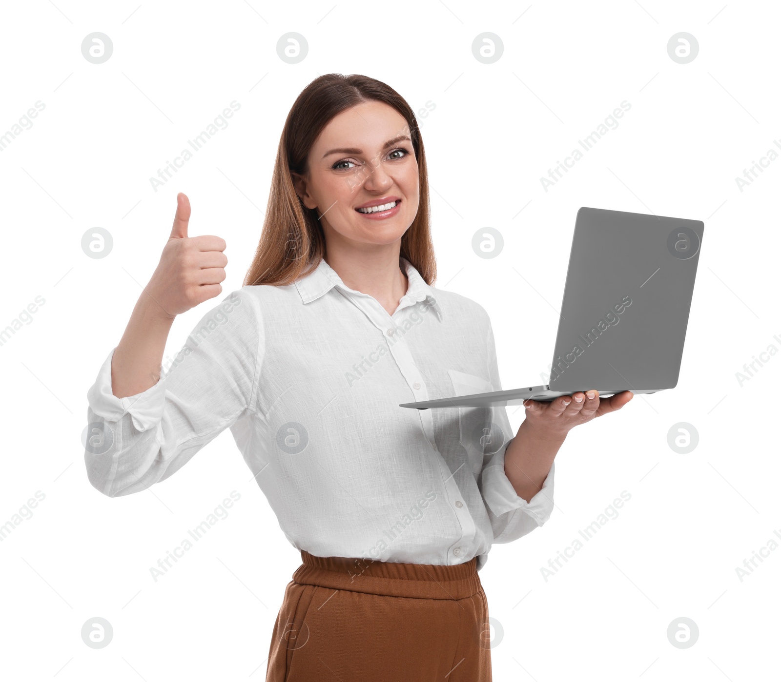 Photo of Beautiful businesswoman with laptop showing thumbs up on white background