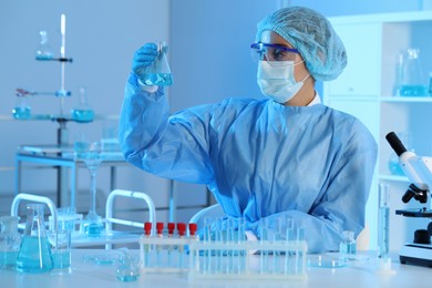 Photo of Scientist working with sample in laboratory. Medical research