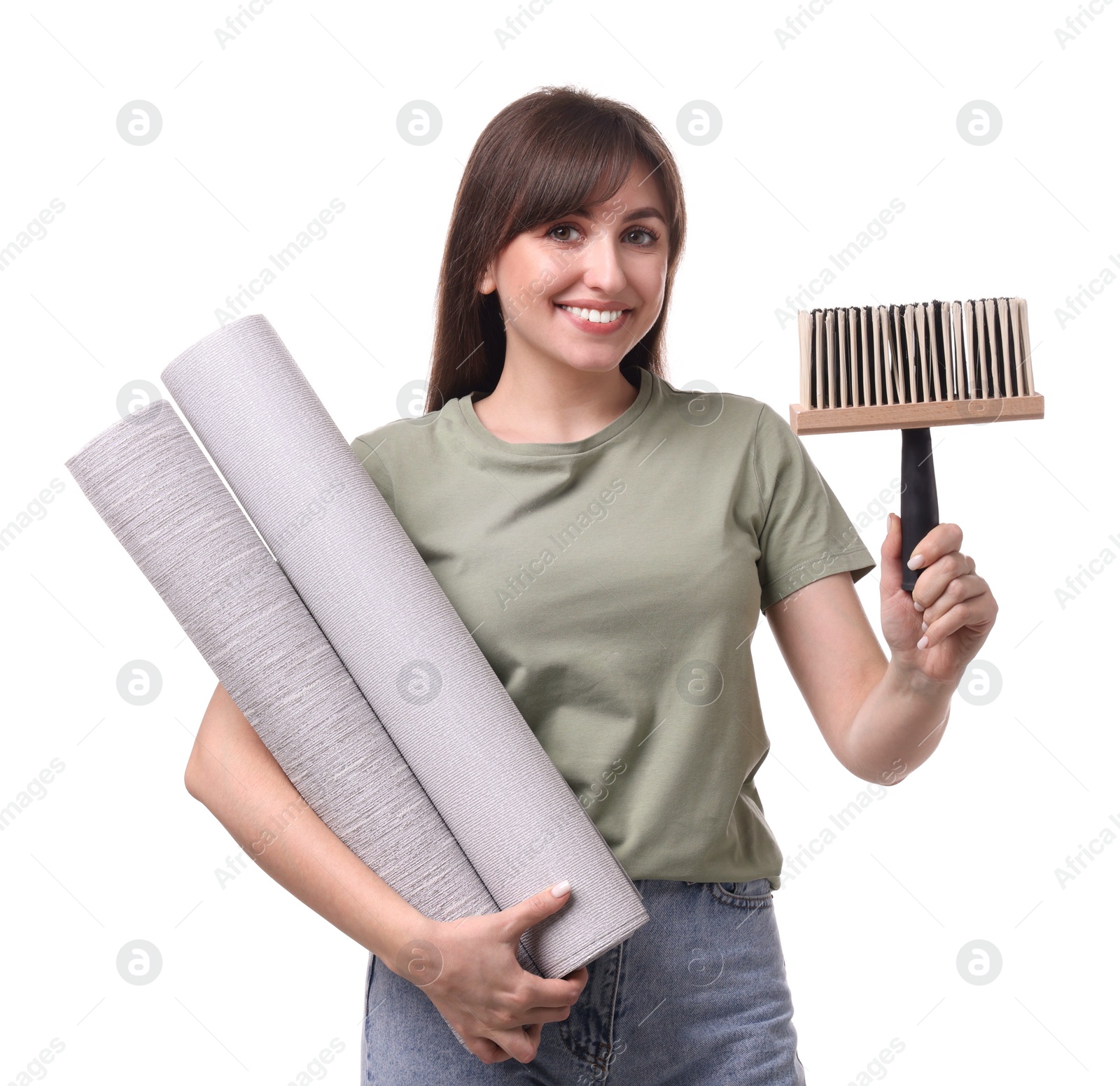 Photo of Beautiful woman with wallpaper rolls and brush on white background