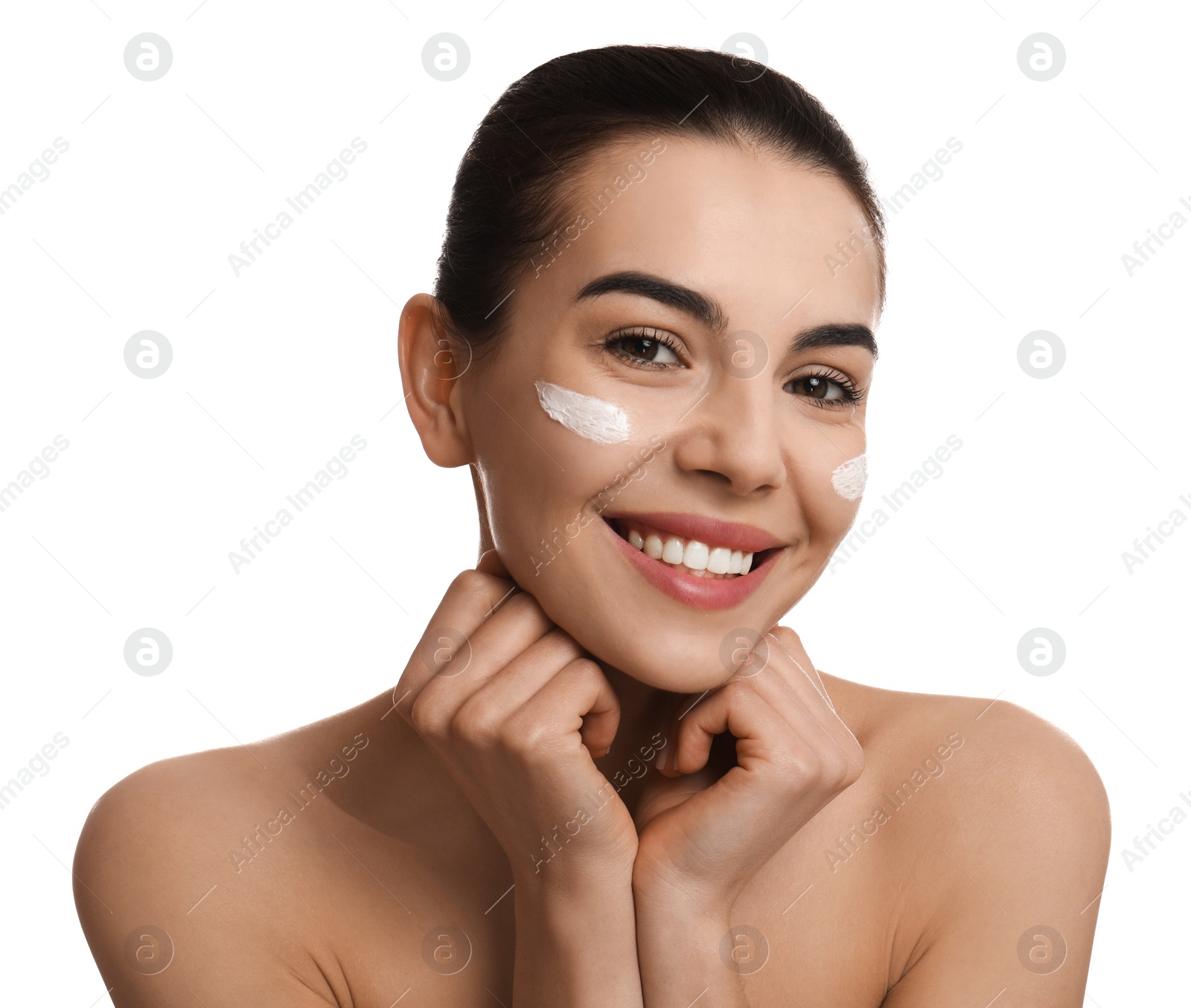 Photo of Young woman with cream on face against white background