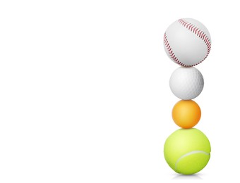 Image of Stack of different sport balls on white background