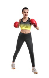 Photo of Beautiful woman in boxing gloves training on white background