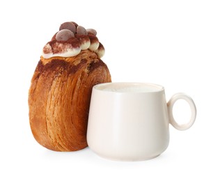 Photo of Round croissant with chocolate chips and cup of drink isolated on white. Tasty puff pastry