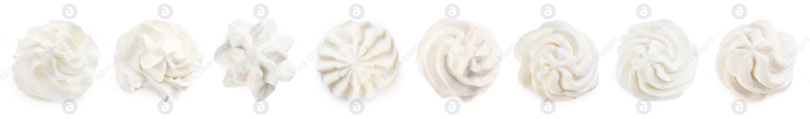 Image of Set with delicious fresh whipped cream on white background, top view. Banner design