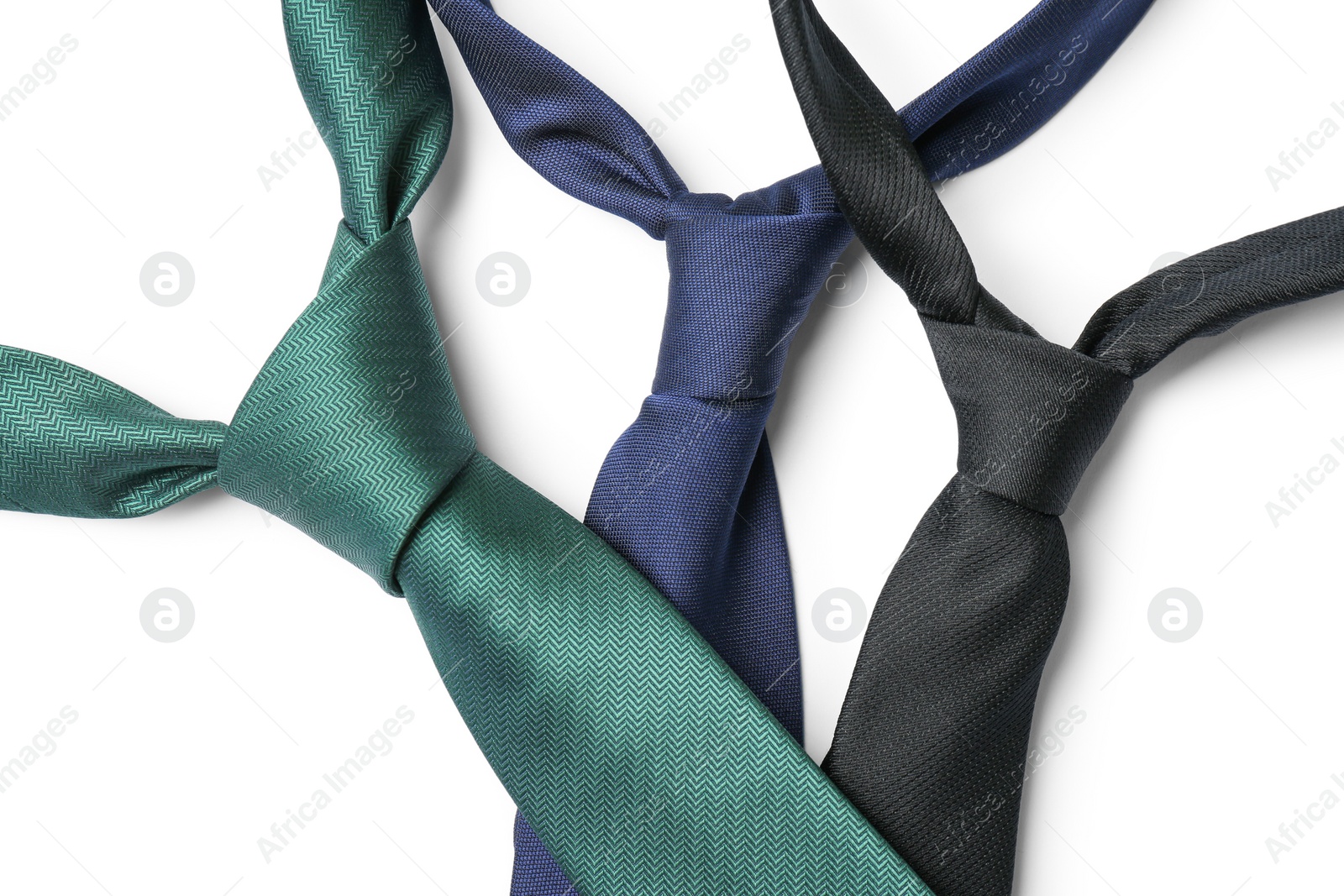 Photo of Color male ties isolated on white, top view