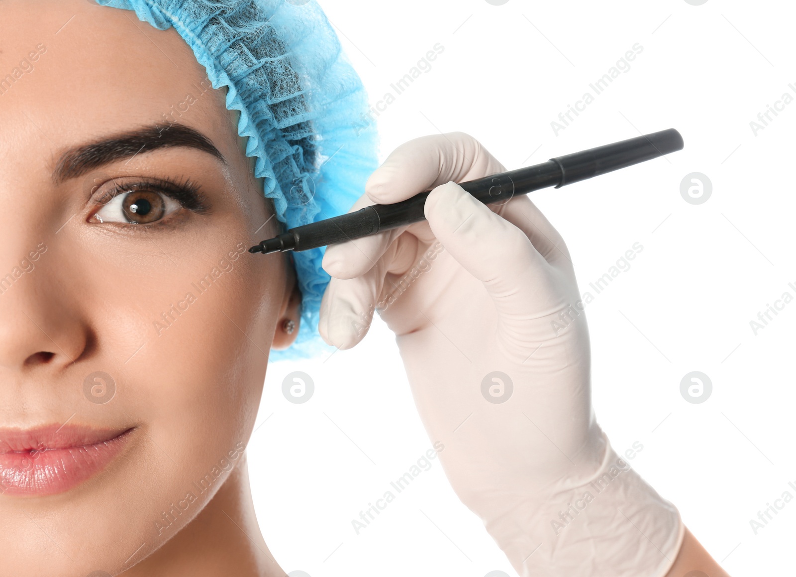 Photo of Doctor holding marker near young woman's face isolated on white, closeup. Plastic surgery concept