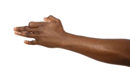 Photo of African-American man gesturing dog head on white background, closeup