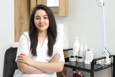 Cosmetologist in medical uniform in modern clinic