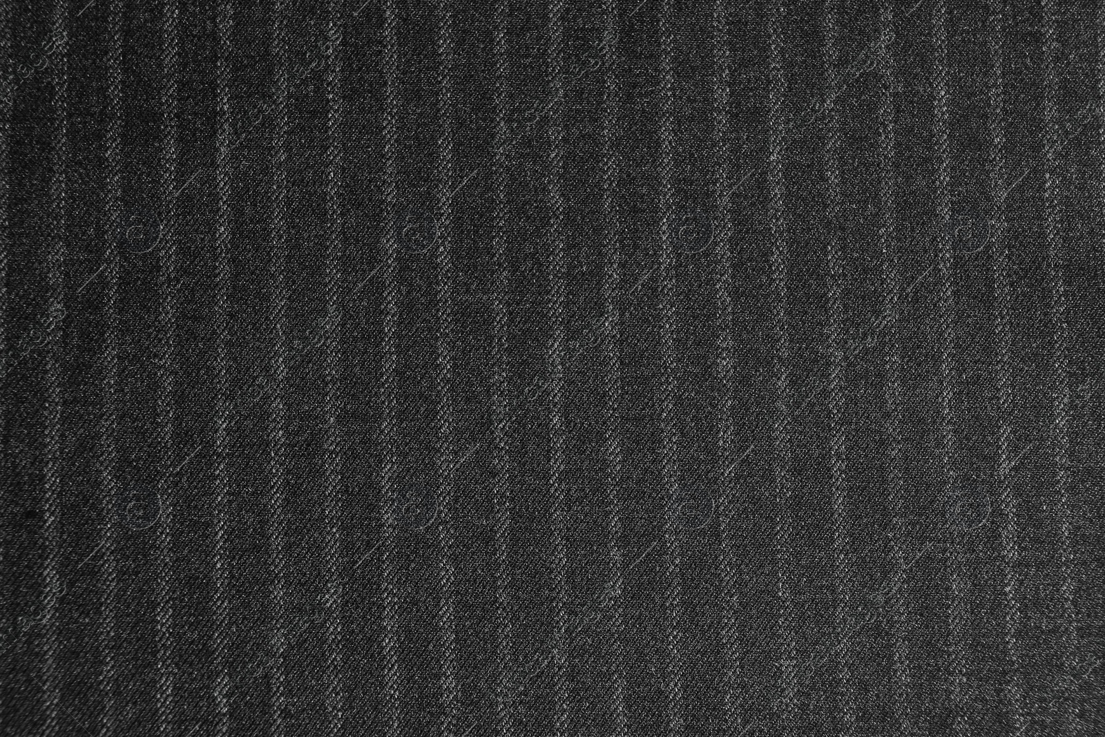 Photo of Texture of dark striped fabric as background, closeup