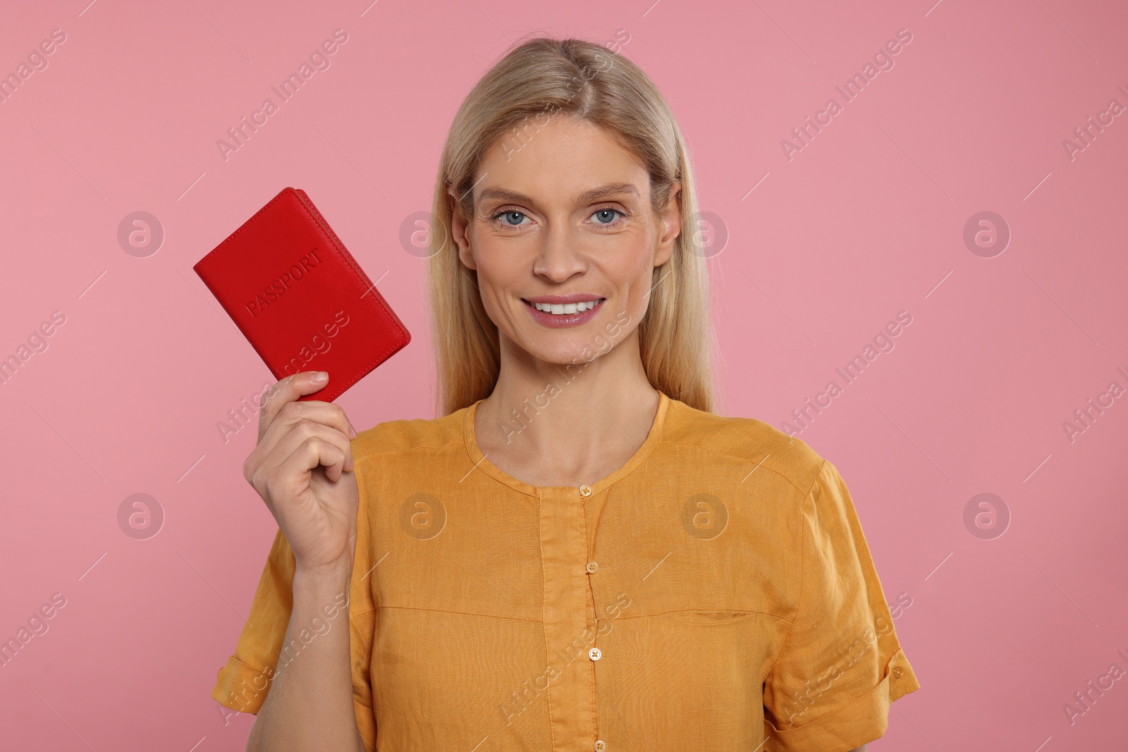 Photo of Immigration. Happy woman with passport on background