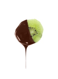 Photo of Tasty kiwi dipped into chocolate fondue on white background