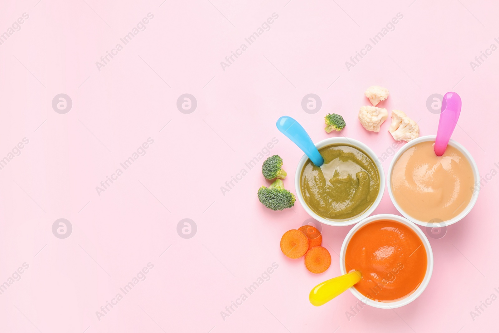 Photo of Healthy baby food and ingredients on pink background, flat lay. Space for text