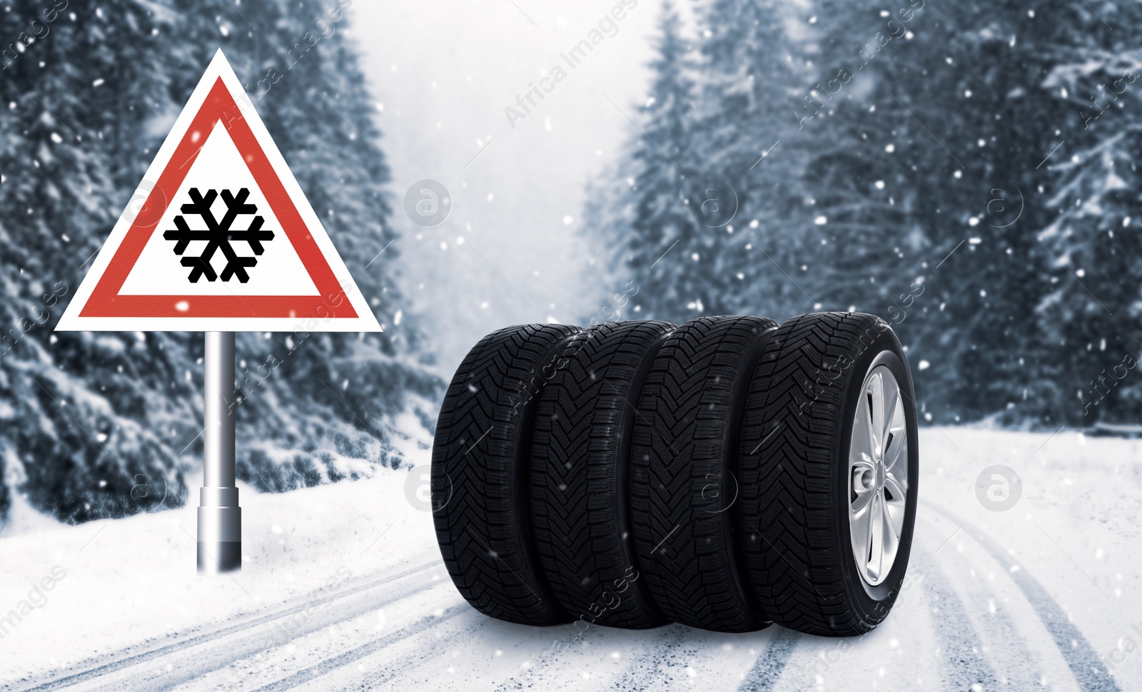 Image of Set of wheels with winter tires and road sign outdoors