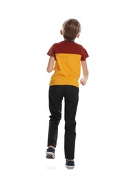 Photo of Little boy running on white background, back view