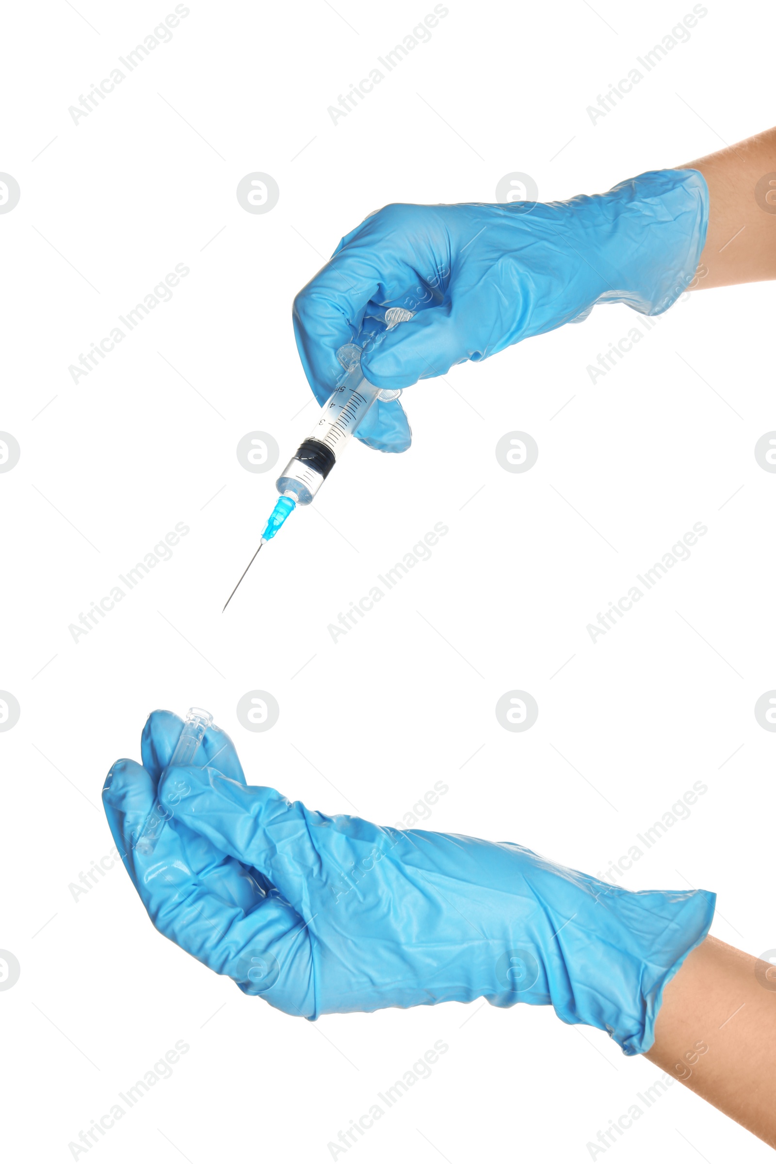 Photo of Doctor in medical gloves holding syringe on white background