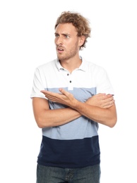 Young man in casual clothes posing on white background