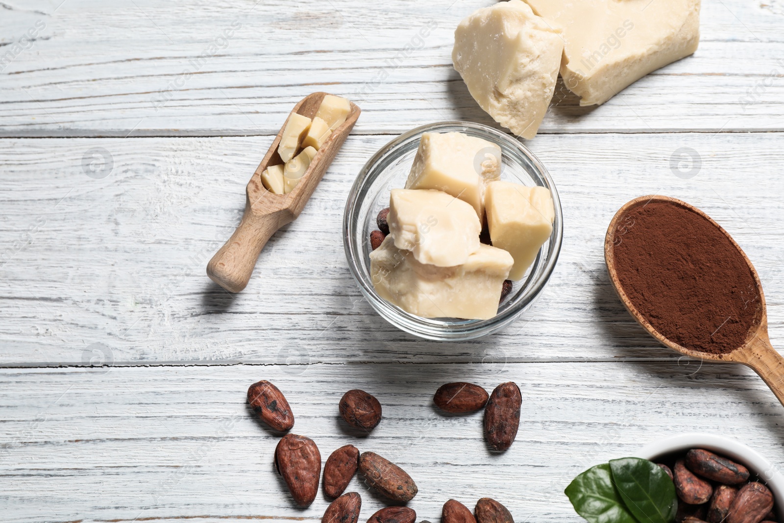 Photo of Flat lay composition with organic cocoa butter on white wooden table