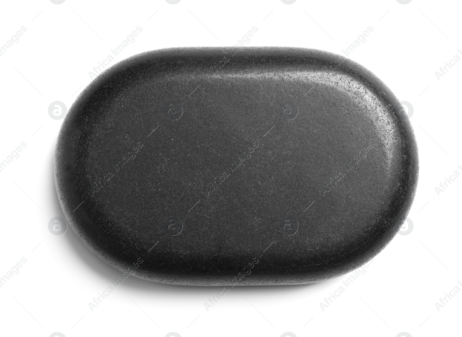 Photo of Black spa stone isolated on white, top view