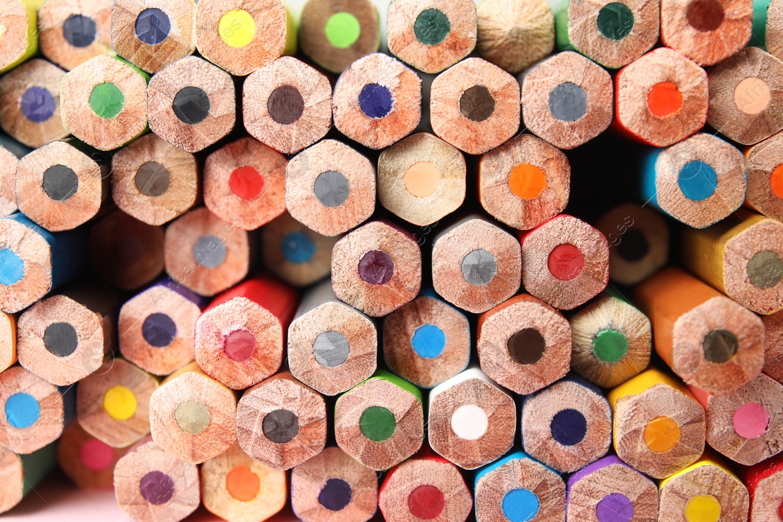 Photo of Different color pencils as background, top view