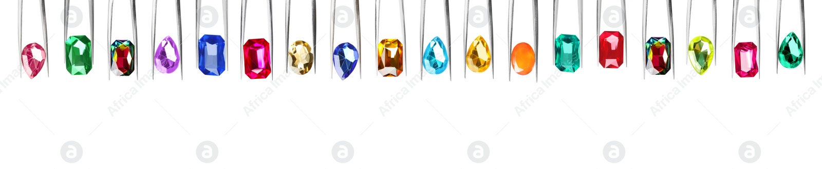 Image of Set of tweezers with different shiny gemstones on white background. Banner design