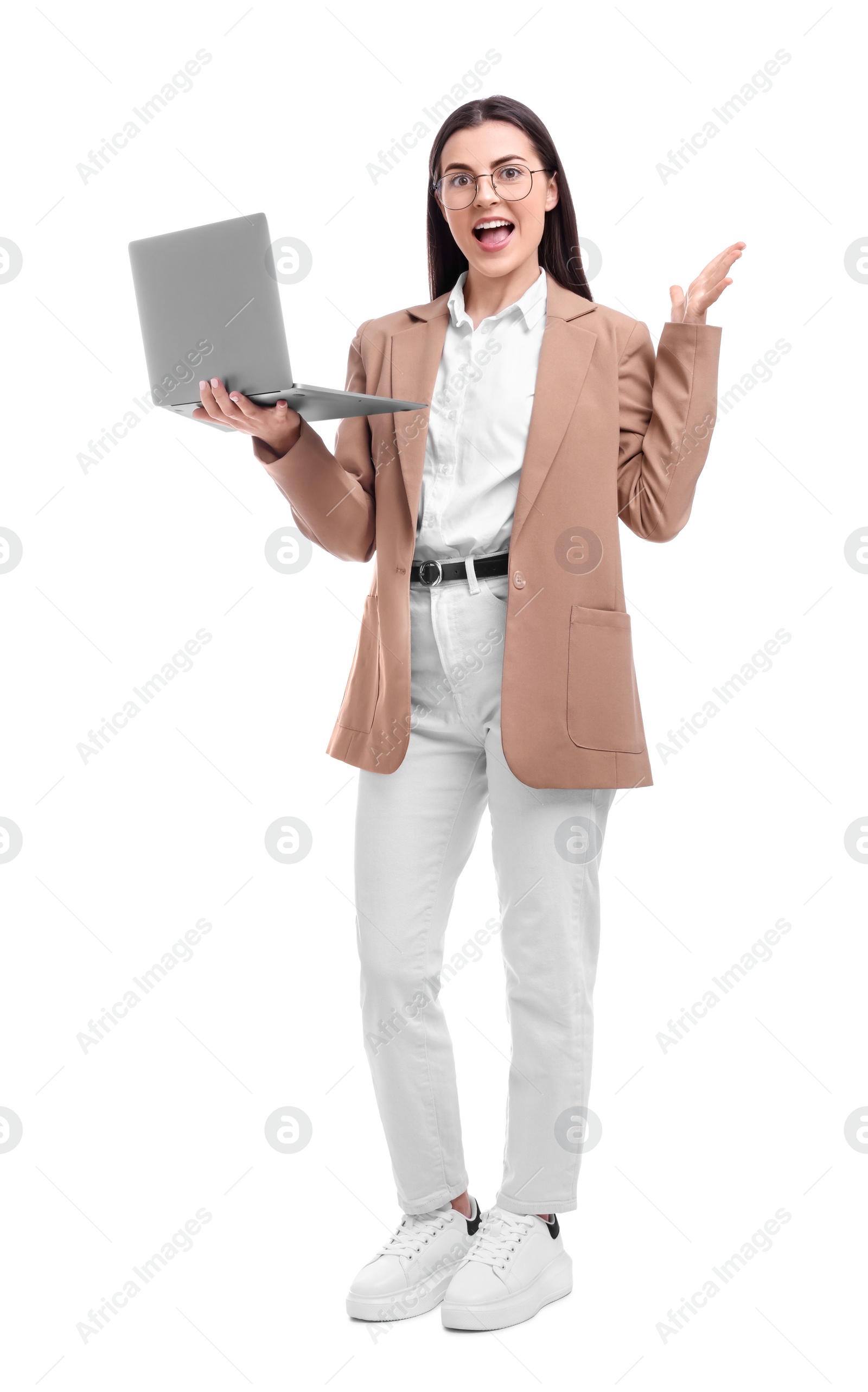 Photo of Beautiful emotional businesswoman with laptop on white background