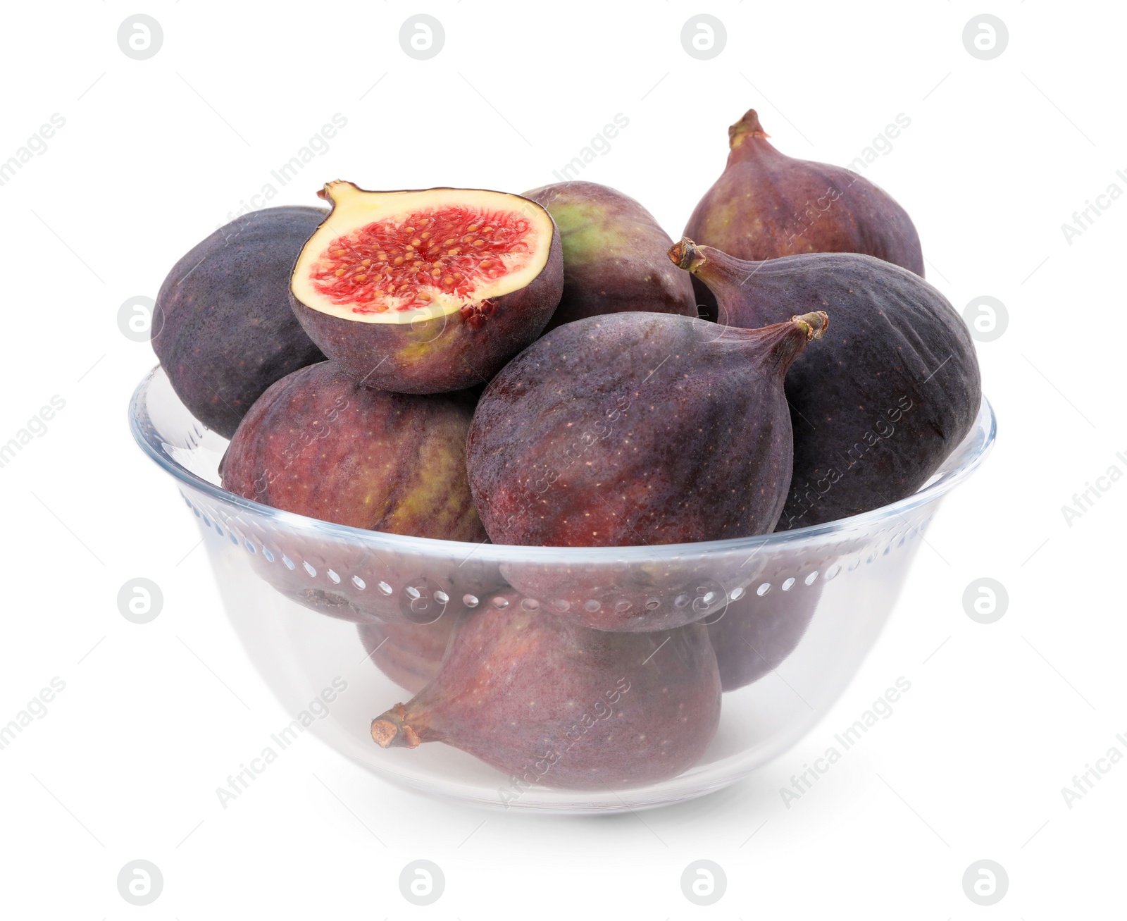 Photo of Whole and cut tasty fresh figs in glass bowl isolated on white