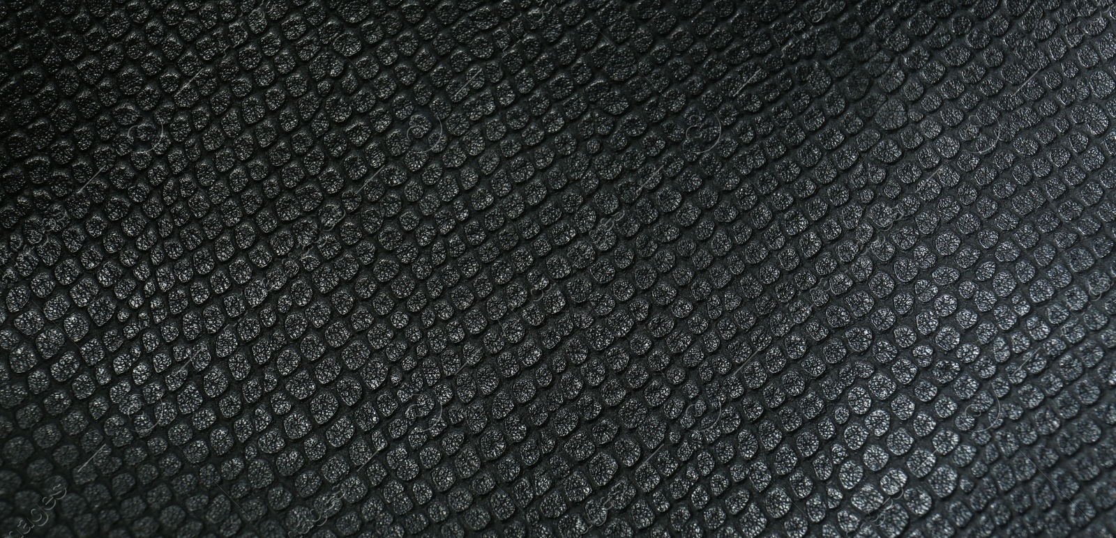 Photo of Black natural leather as background, above view