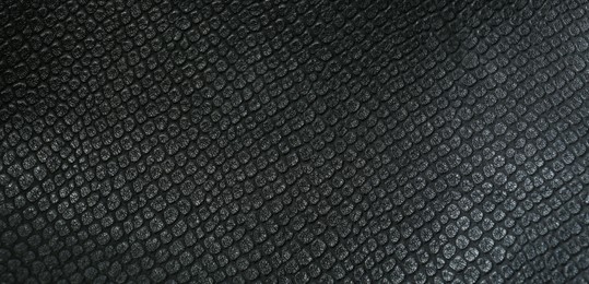 Black natural leather as background, above view