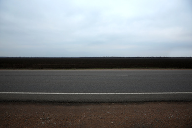 Photo of Beautiful view of asphalt highway without transport