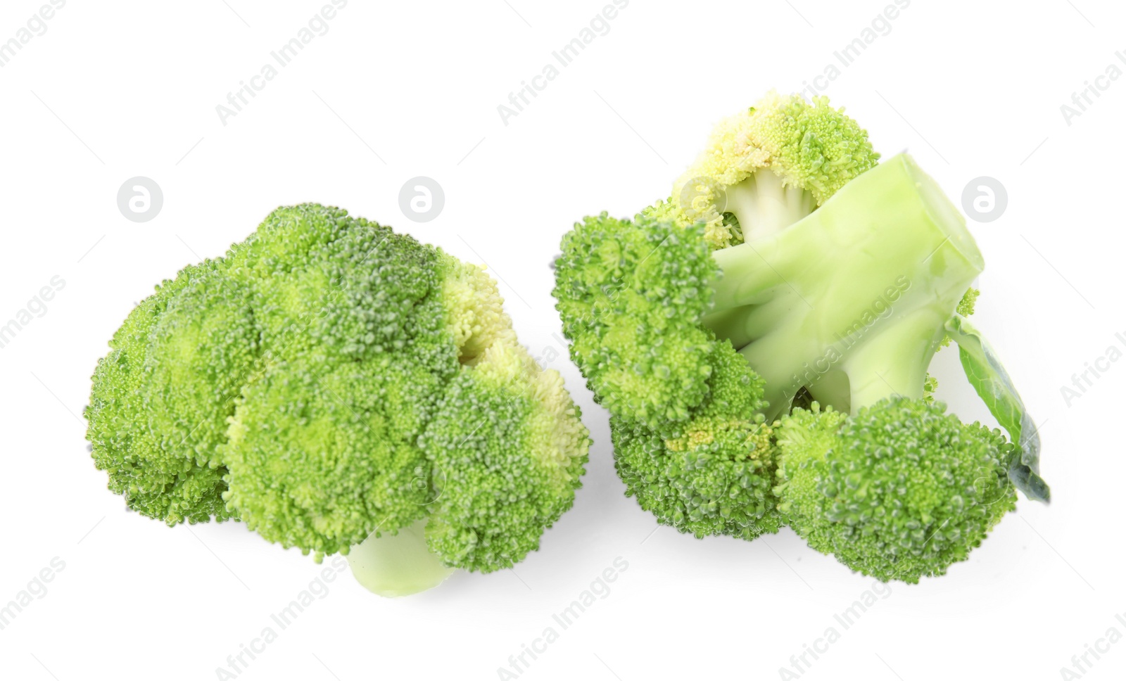 Photo of Fresh raw green broccoli isolated on white, top view