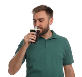 Handsome man with cold kvass on white background. Traditional Russian summer drink