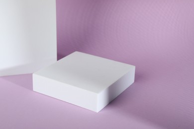 Photo of Presentation of product. Podium on color background, space for text