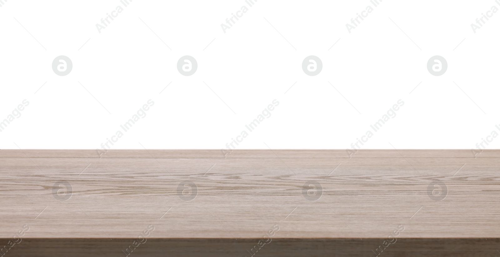 Photo of Empty light wooden table isolated on white