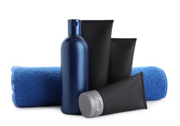 Set of men's cosmetic products and towel on white background