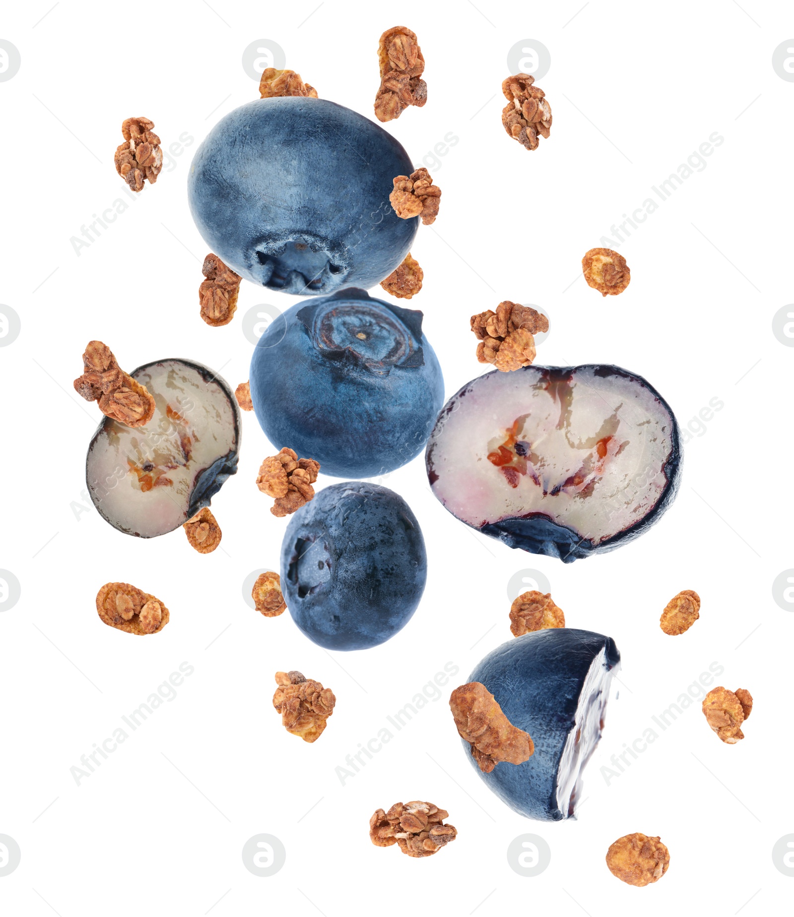 Image of Delicious granola and blueberries falling on white background. Healthy snack  