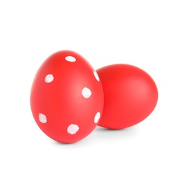 Creative painted red Easter eggs on white background