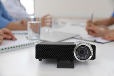 Video projector on table during medical conference